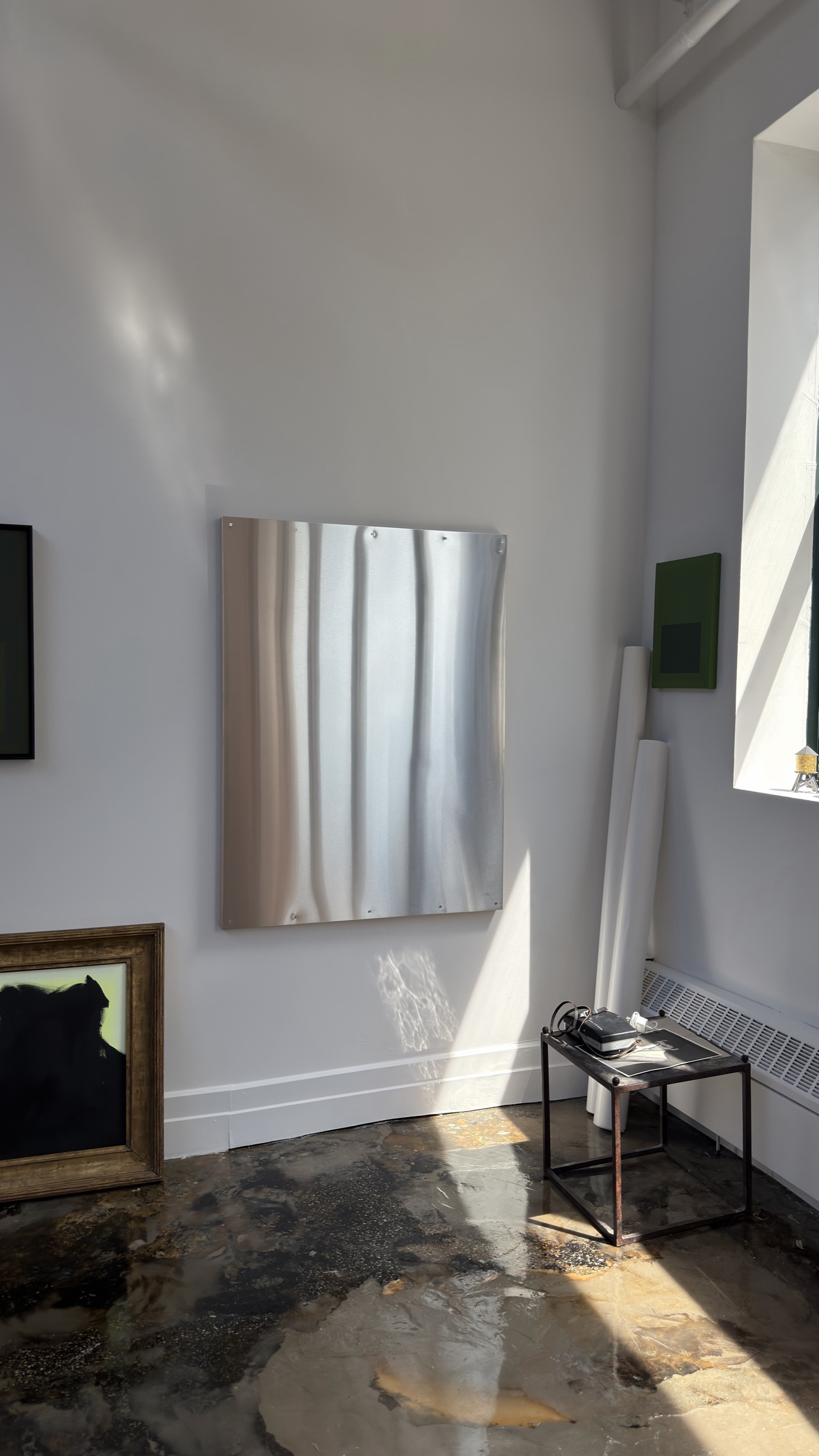 Studio wall and light with silver work
