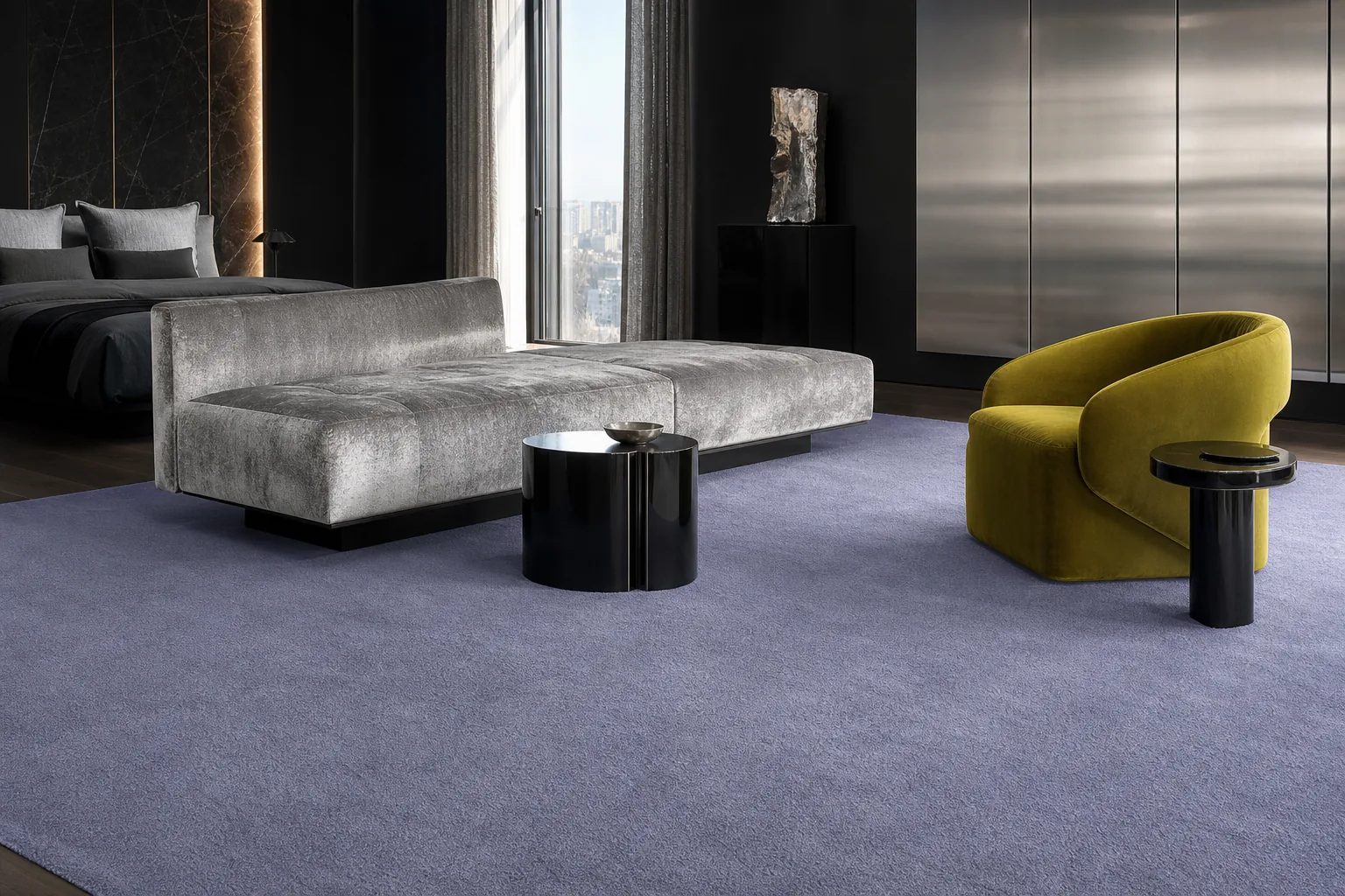 A periwinkle MAJLIS rug beneath a bed and lounge chair in a dark contemporary bedroom.